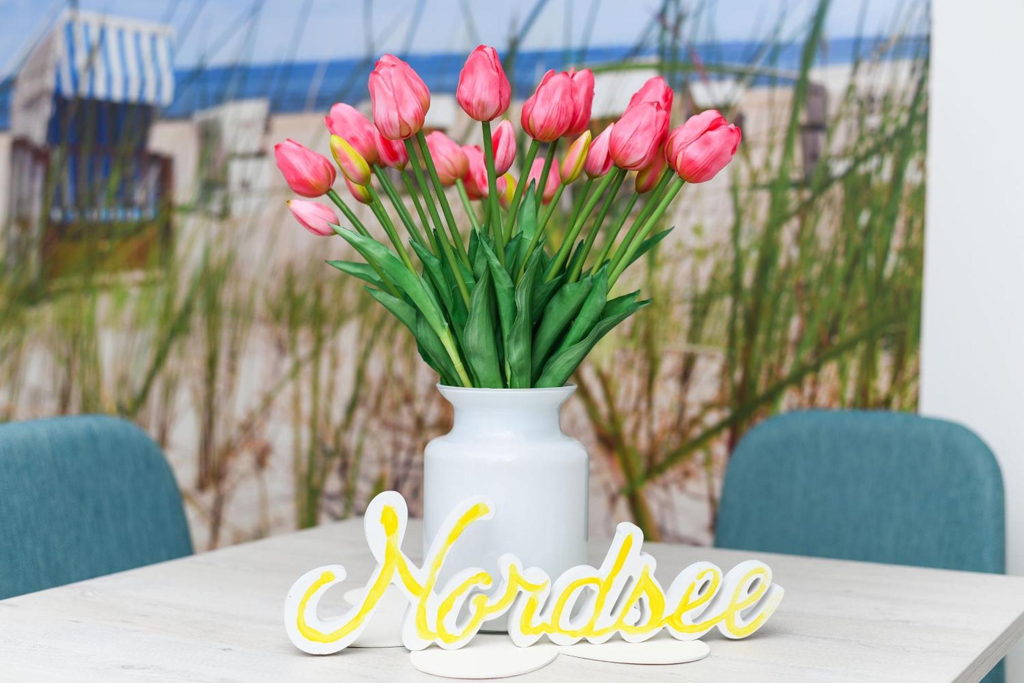 Ferienwohnungen Im Haus Strandkorb Bensersiel Exterior foto