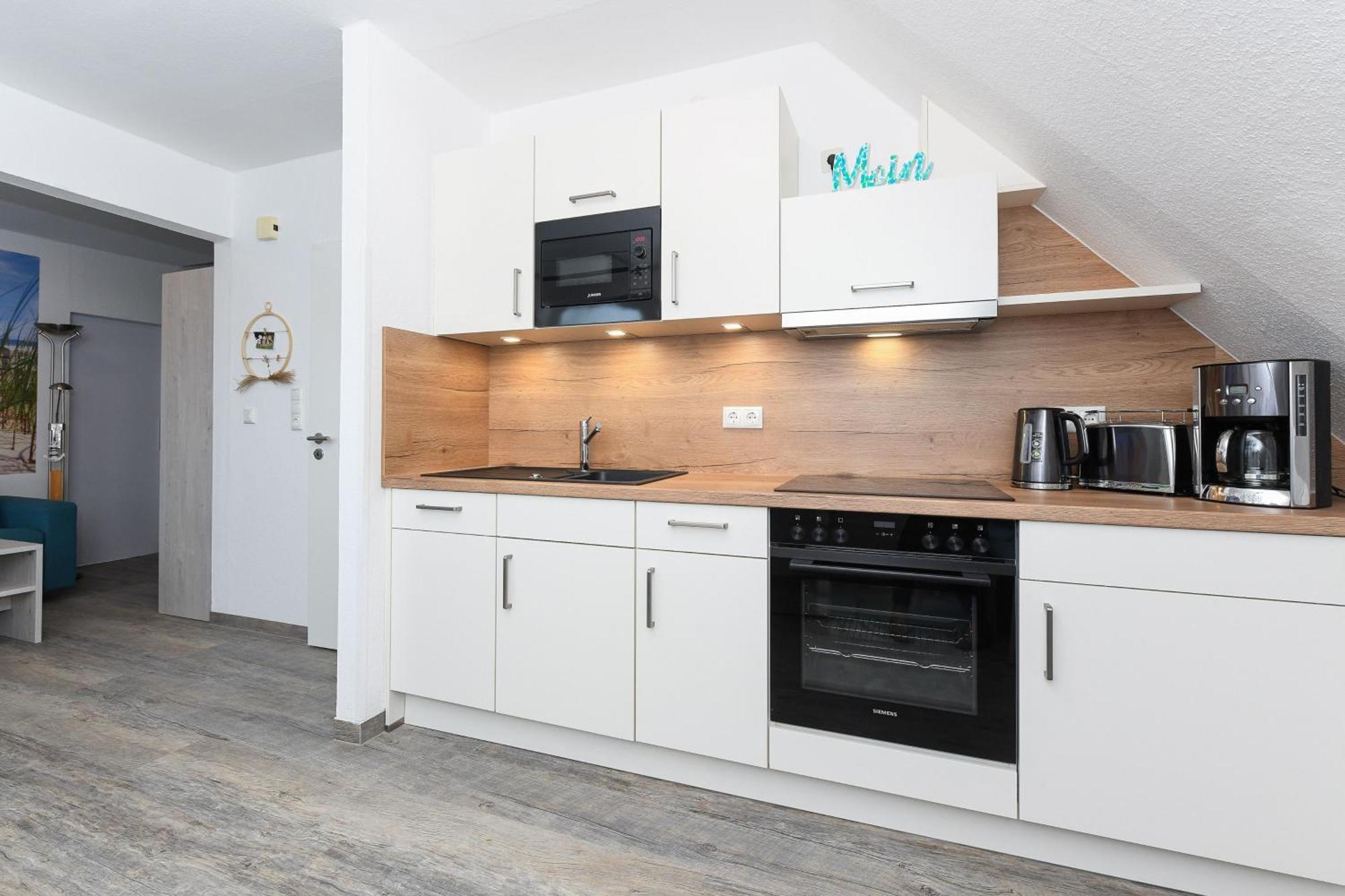 Ferienwohnungen Im Haus Strandkorb Bensersiel Exterior foto